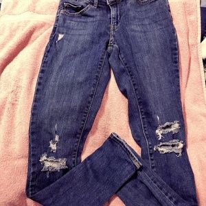 Levis 711 Distressed denim skinny jeans